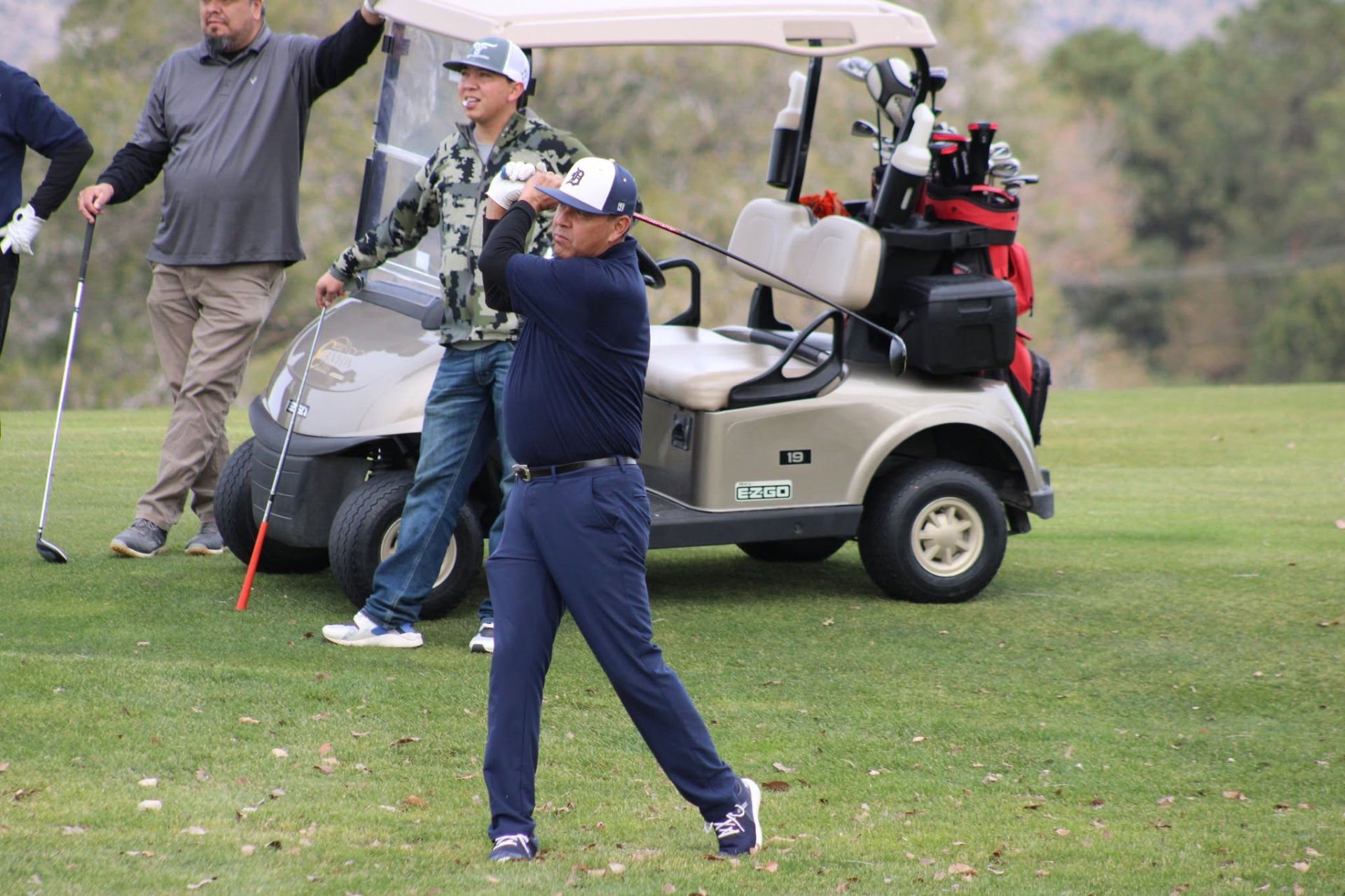 Golfer following through on a swing